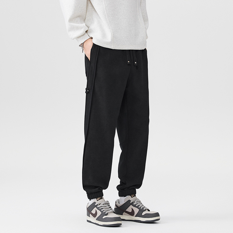 2025 otoño y invierno nuevos pantalones negros para hombres sueltos pantalones deportivos casuales de cintura elástica de tamaño grande con etiquetas colgantes image 3