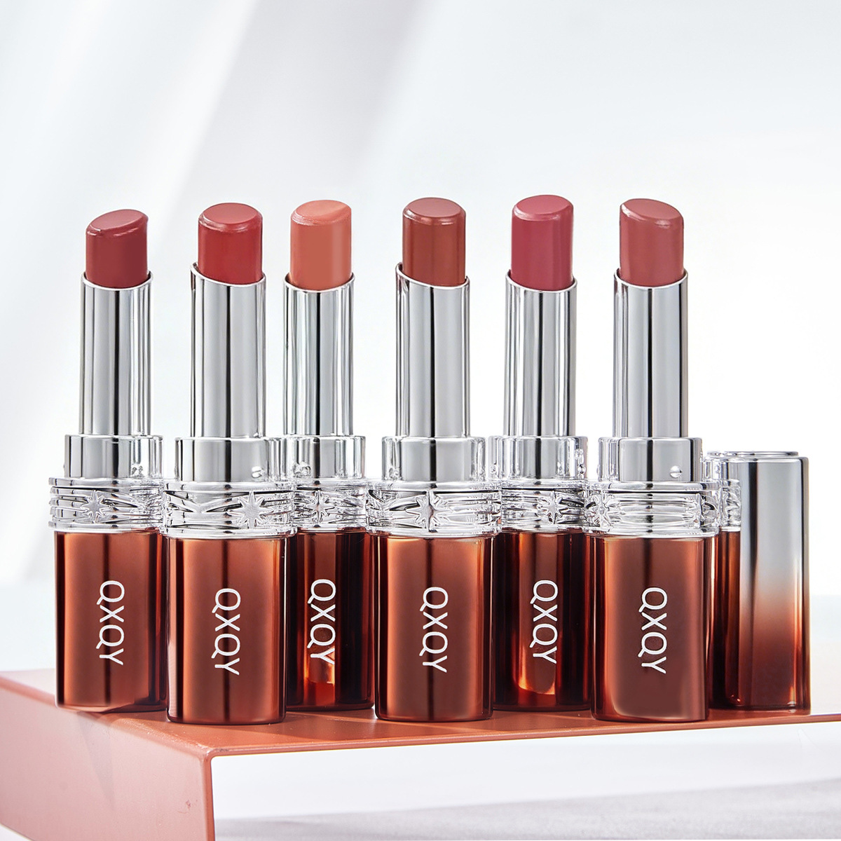 QXQY color de agua de lujo lápiz labial esmalte labial espejo esmalte labial otoño invierno esmalte labial humectante esmalte labial maquillaje transfronterizo