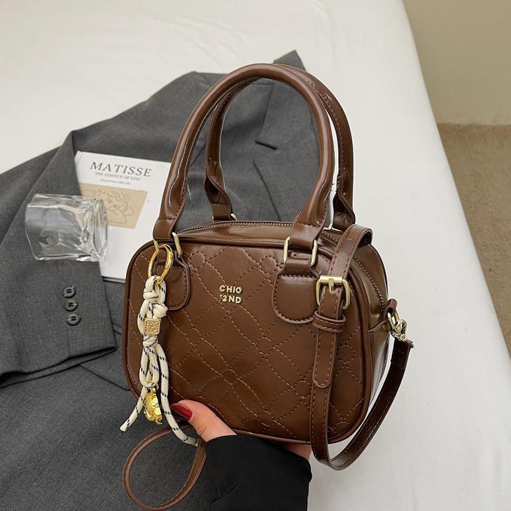 Este año, la popular explosión de bolsos de mano para mujeres 2025, nueva moda universal, bolsos de hombro, bolsos de béisbol de moda de textura