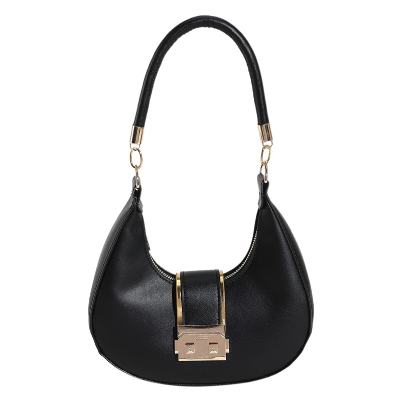 Bolso de hombro de cercanías simple bolsa de axilas retro de las mujeres 2023 otoño nuevo diseño de nicho bolsa de media luna de color caramelo