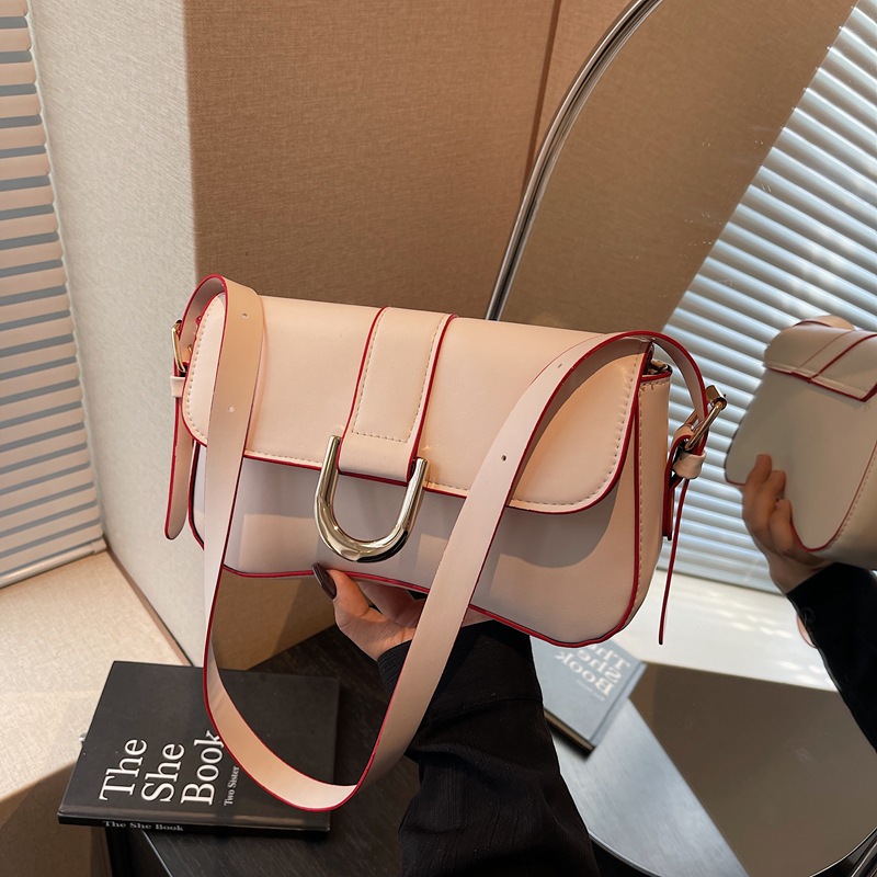 Nicho francés bolsos bajo la axila 2025, nuevo estilo de moda de verano, mochila de hombro, textura, bolsos de mujer elegante.