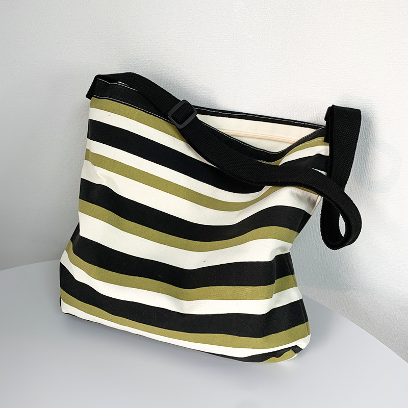 Nuevo Cruz-cuerpo bolsa de lona femenina de un solo hombro estudiante clase libro bolsa Bolsa de Comercio Exterior bolsa de la raya