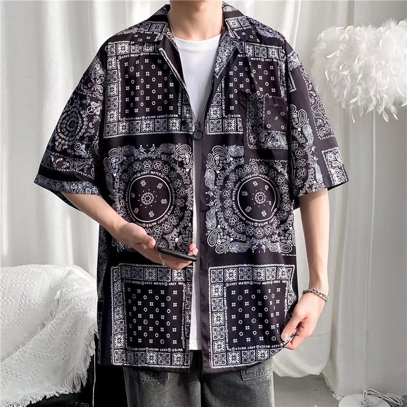 Hong Kong estilo Retro Vintage floral camisa de manga corta Estilo Hawaiano tailandés diseño sentido Ruan guapo camisa suelta para hombres y mujeres