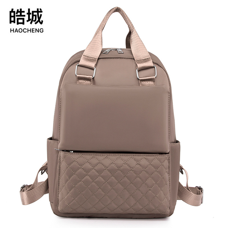 Fábrica al por mayor 2023 primavera nuevas señoras Oxford mochila de moda bordada rómbico mochila de gran capacidad mochila escolar