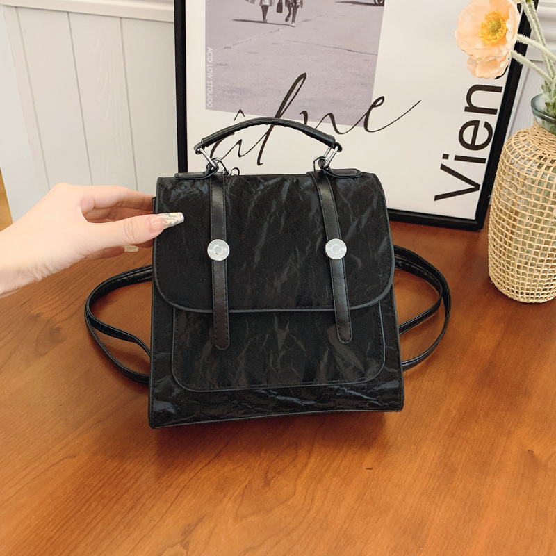 Mochila pequeña 2024 nuevo estilo de diseño de moda nicho de viaje bolsas escolares ligeras para mujeres ins para salir mochila pequeña