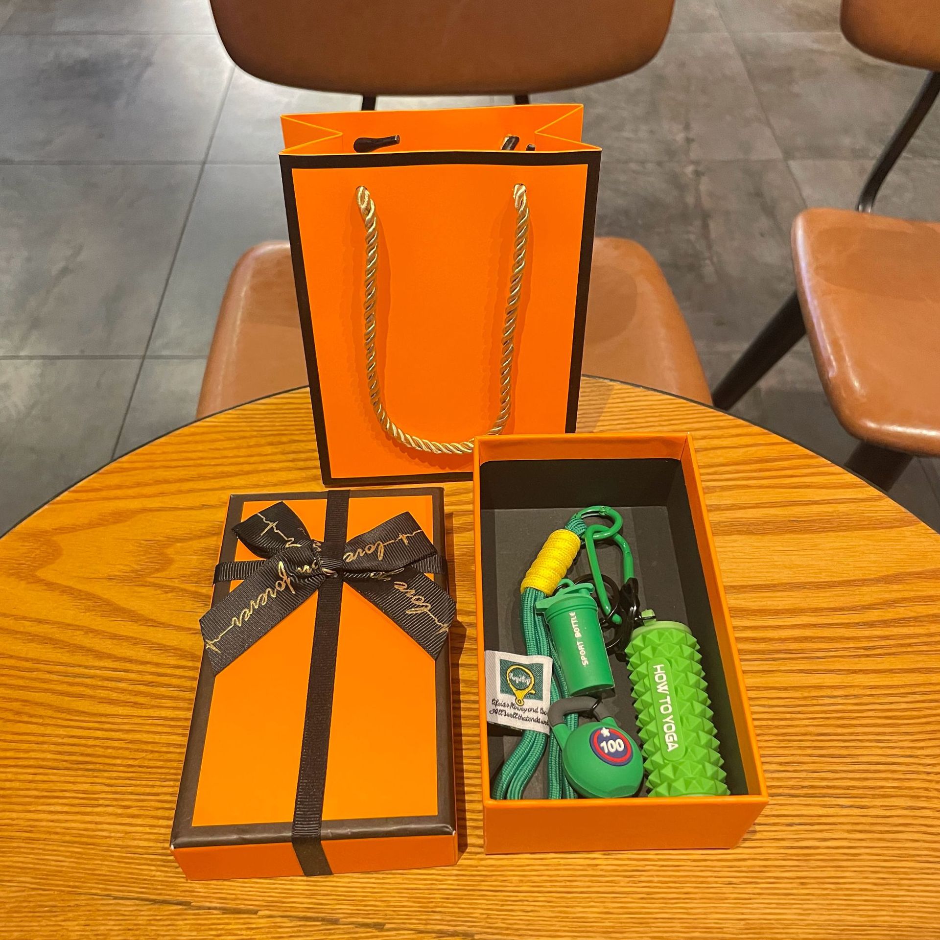 Green set for yoga from foam, orange gift box
