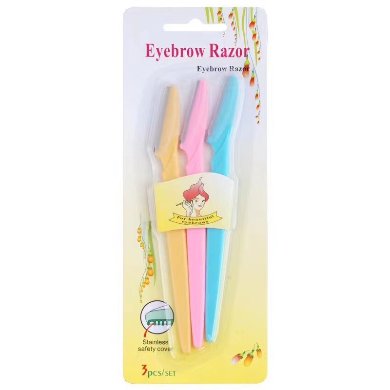 Tinkle set de cuchillo de cejas de tres colores cubierta de seguridad de acero inoxidable cuchillo de cejas portátil artefacto de cejas explosivo transfronterizo