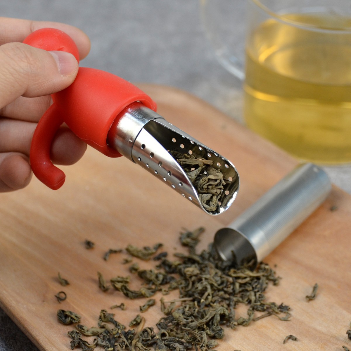 Colador de té creativo de acero inoxidable con cuchara de té colgando portátil de silicona en forma humana fabricante de té al por mayor lindo Filtro de té