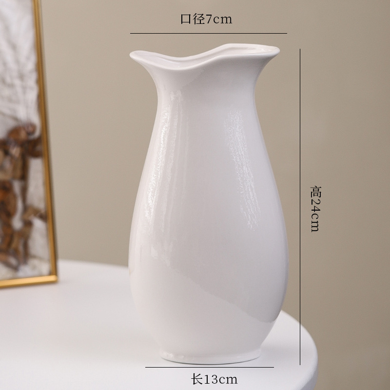 シンプルな現代の満天星陶磁器の花瓶の置物の客間の白い磁器の小さい清新な乾いた花の生け花の創意の陶磁器の花器|undefined