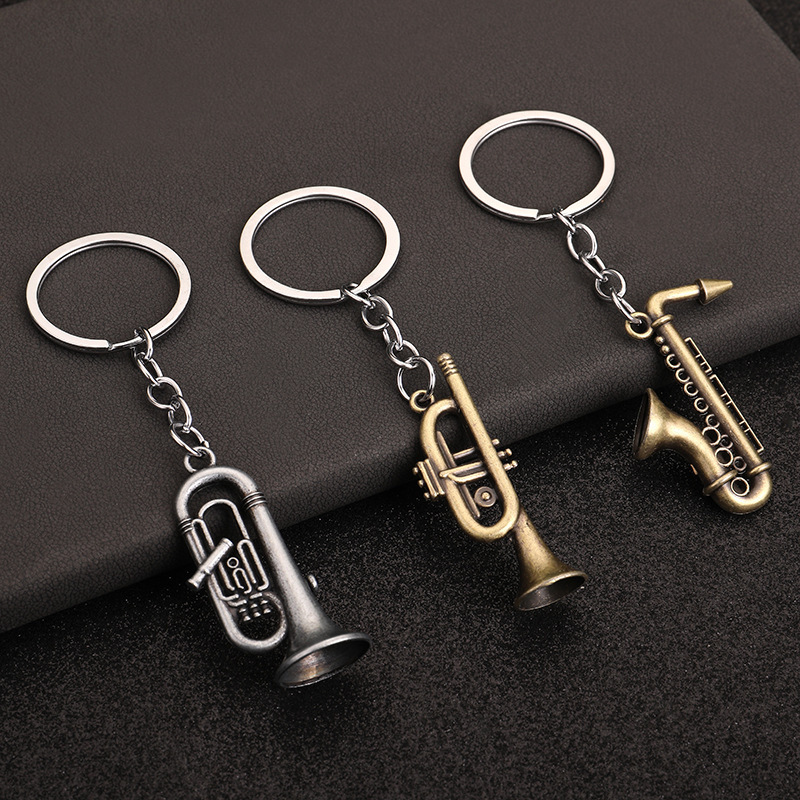 Cross-Border Wholesale Mini Musical Instruments, Miniature Toy Saxophones, Mini Metal Keychain Pendants, Music Gifts in Stock Cross-Border Wholesale Mini Musical Instruments, Miniature Toy Saxophones, Mini Metal Keychain Pendants, Music Gifts in Stock