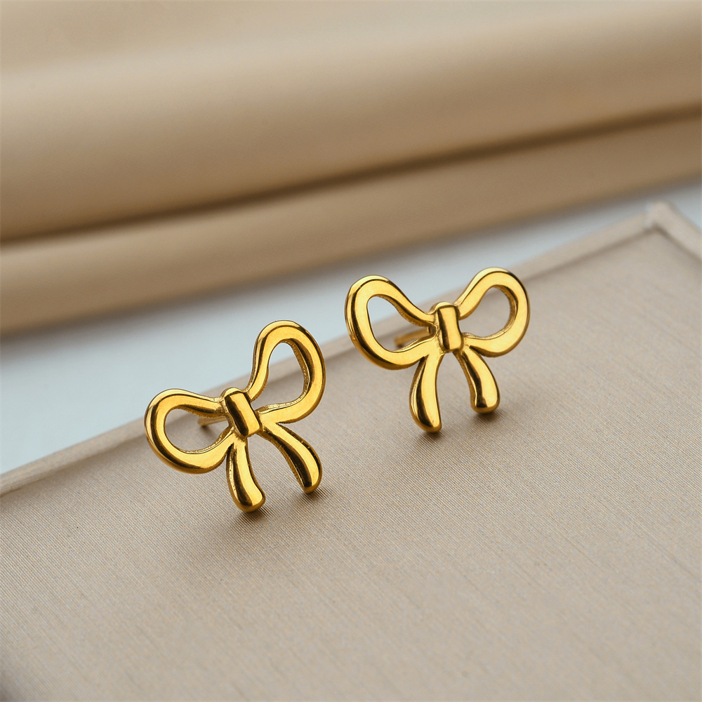 Colgante de arco dulce clásico colgante de acero de titanio de cuerpo completo para mujeres no se desvanece nicho ligero lujo sensación accesorio cadena clavícula