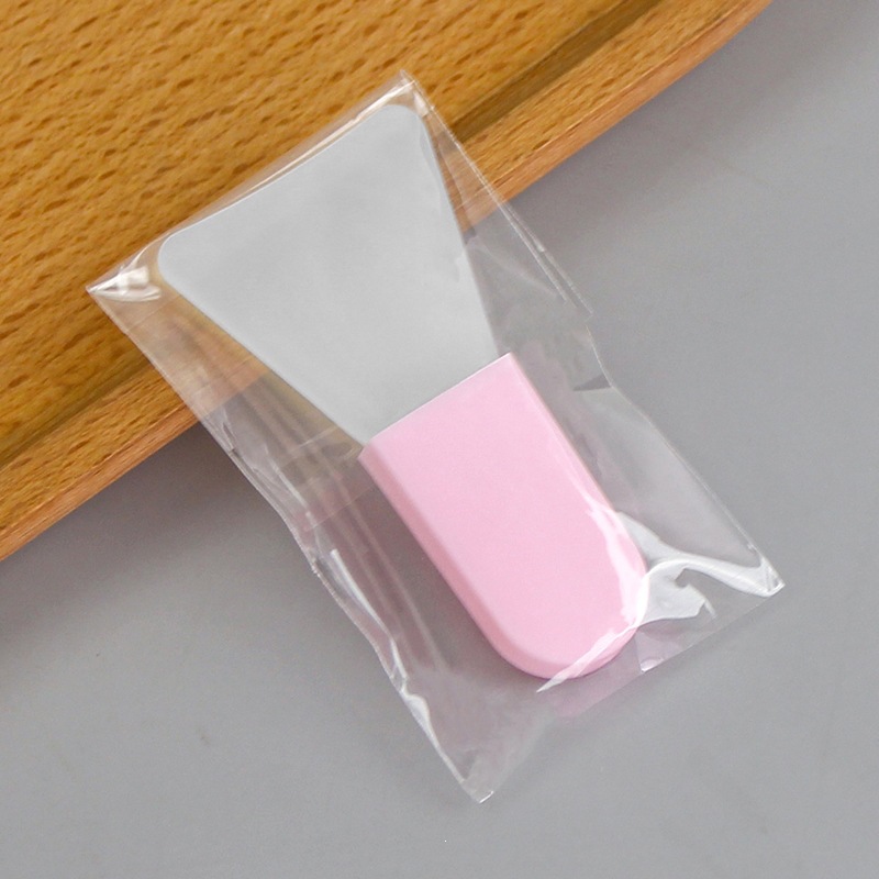 Pink wand: spade brush with short handle