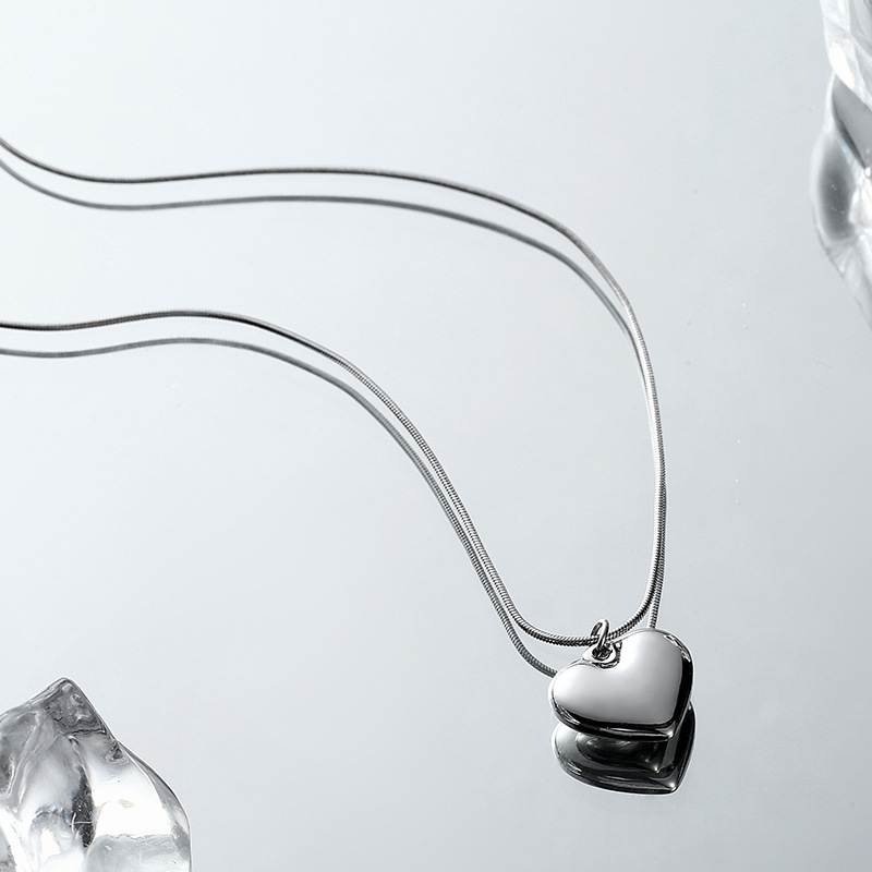 Collier en acier titane pour femme, simple, luxueux, sensation haut de gamme, chaîne de clavicule en forme de cœur de mousson d'été,_voghion.com