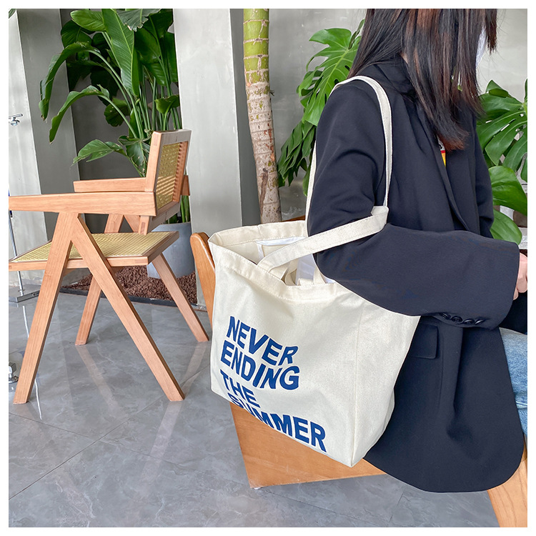 A large-capacity, sturdy Japanese-style canvas bag for women, a new 2022 simple bento handbag for girls to go to work undefined