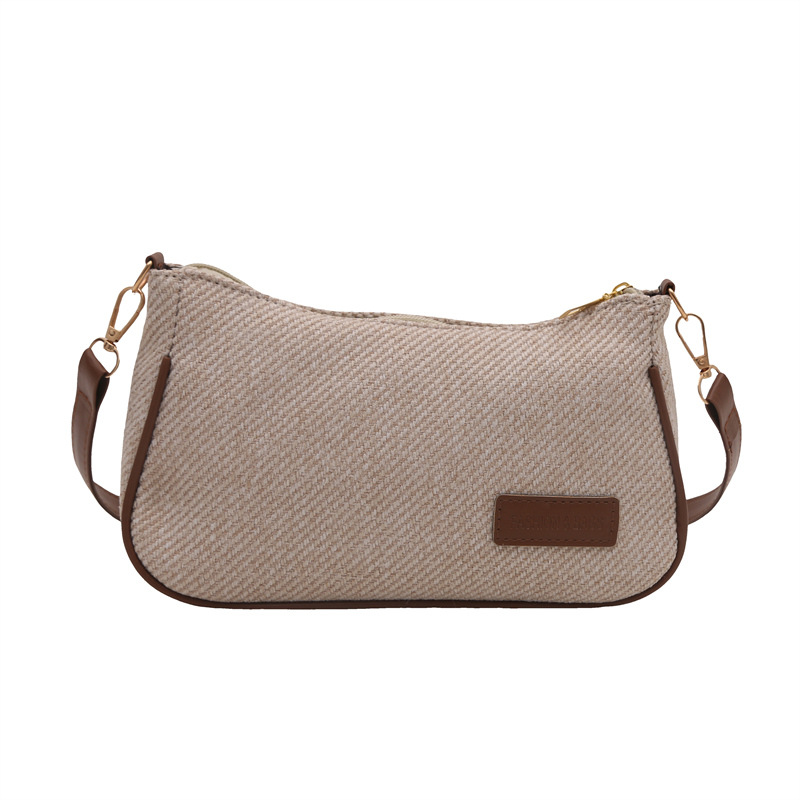 Elegante y simple temperamento nicho bolso de hombro casual 2025 primavera nuevo bolso de mochila de mujer versión coreana bolso popular