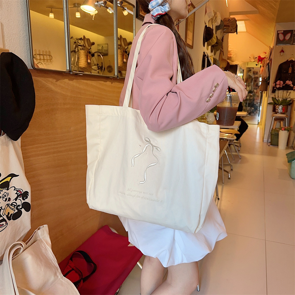 44284 large-capacity double-sided embroidered bow, sweet tote bag, single-shoulder cloth bag, canvas schoolbag for girls undefined