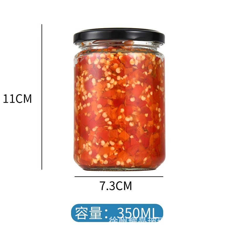 Botella de vidrio redonda de grado alimenticio, botella enlatada transparente sellada, botella de salsa de chile vacía, botella de miel con tapa para cocinar