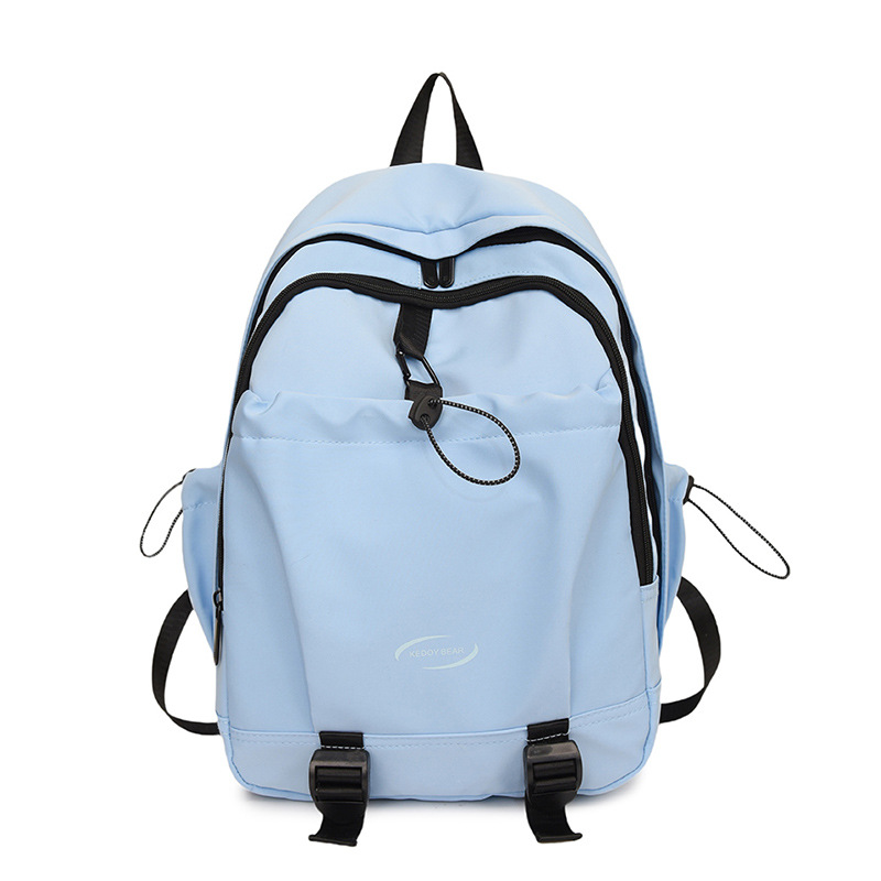 Nuevo estilo coreano transfronterizo de color sólido simple y versátil para estudiantes de escuela primaria y secundaria de alta capacidad mochila de viaje