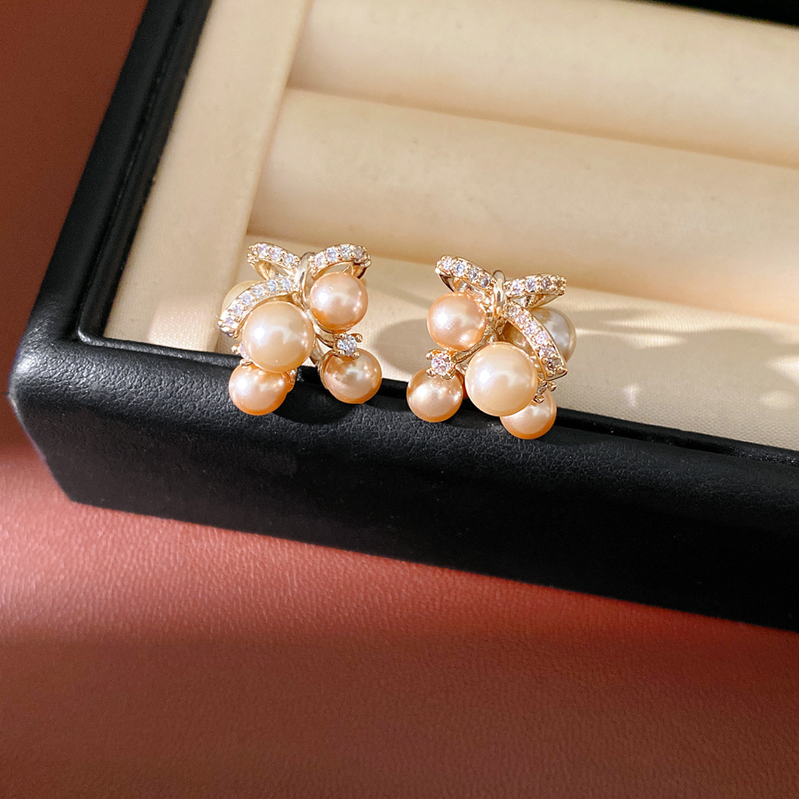 Agujas de plata mariposa gota de piedra aretes de perlas ligeros de lujo de alta calidad pernos diarios temperamento al por mayor auriculares