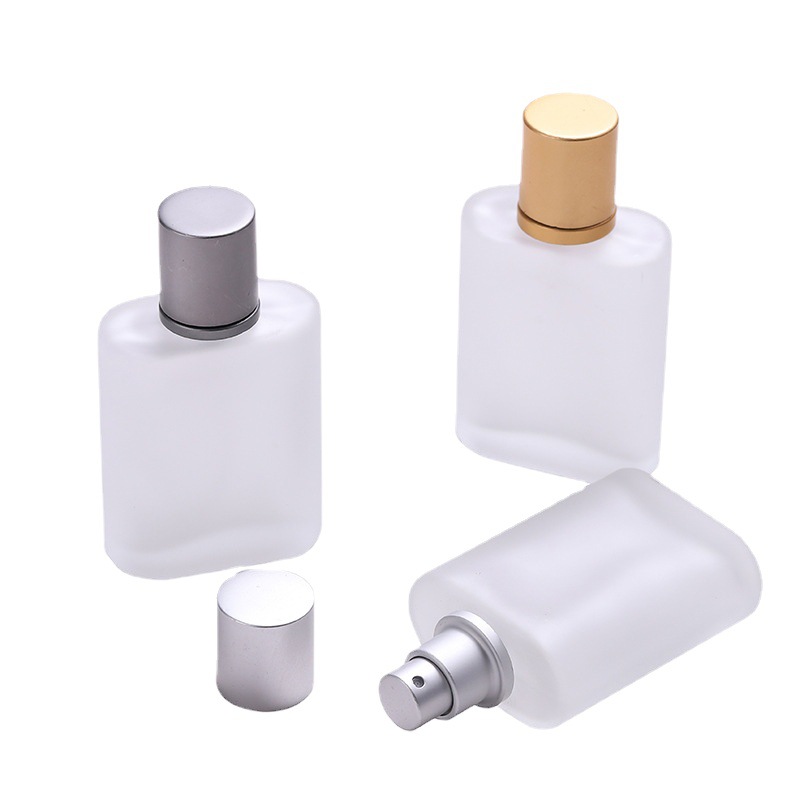 50ml perfume esmerilado botella de spray de vidrio 50CC prensa sub-botella 50ml viaje portátil niebla fina botella vacía