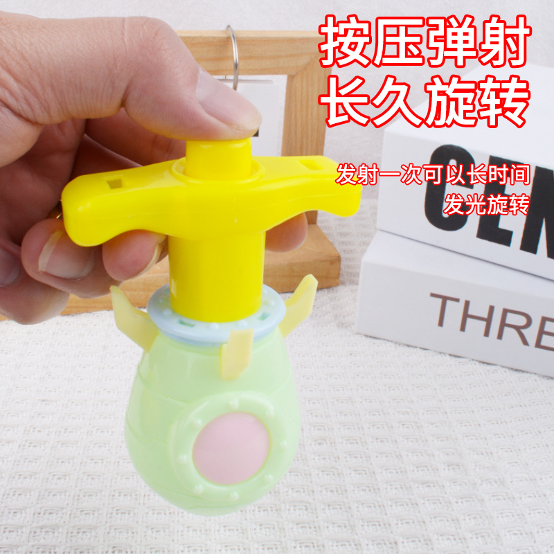 Cohetes creativos giroscópicos de luz jardín de infantes pequeños juguetes recompensas barracas de mercado nocturno juguetes luminosos bebés al por mayor