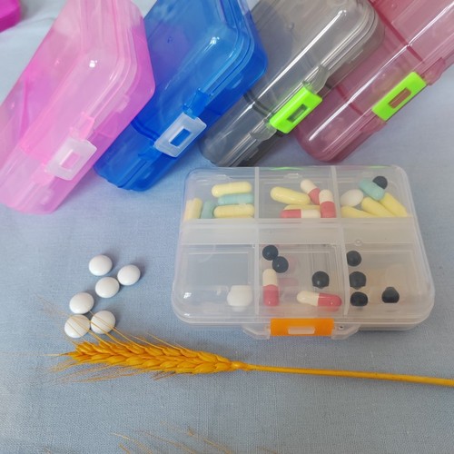 Cross-border new medicine box simple plastic storage box two-layer folding portable medicine box three meals a day plastic box