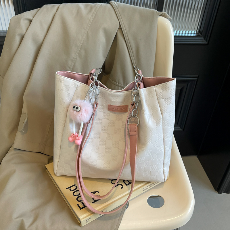 Bolsa de hombro a cuadrillas de alto nivel 2024, nueva bolsa de viaje simple de gran capacidad para estudiantes universitarios.