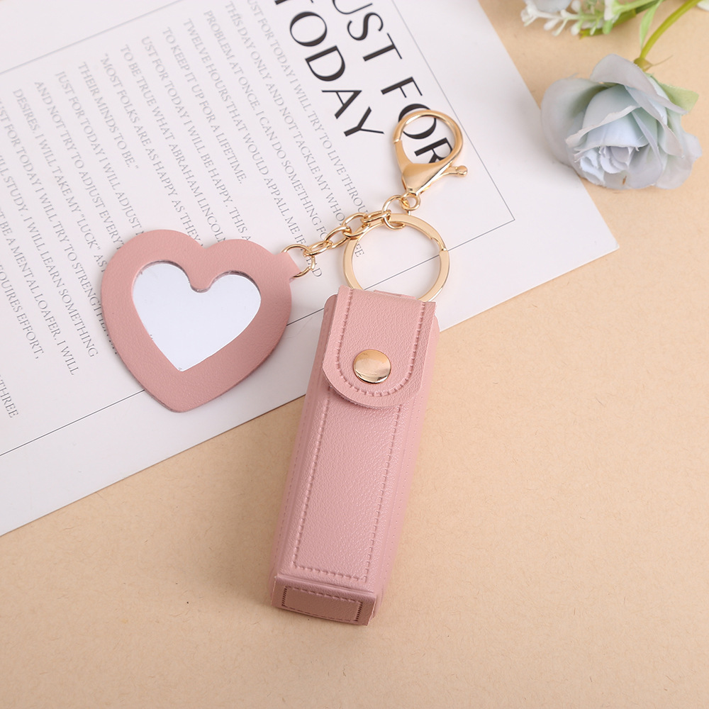Nuevo bolso de almacenamiento de lápiz labial simple sensación de alto nivel hermoso llavero pu cuero mochila colgante accesorios de ropa