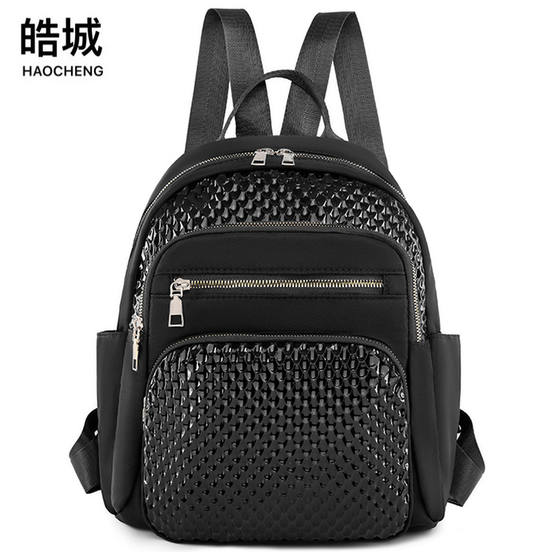 Comercio exterior al por mayor 2023 nuevo estilo casual retro damas mochila de tela Oxford simple y versátil mochila de viaje urbano