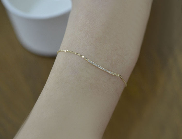 Nuovo bracciale in argento sterling placcato oro con fila di zirconi, design semplice, raffinato e ultra sottile e brillante._voghion.com