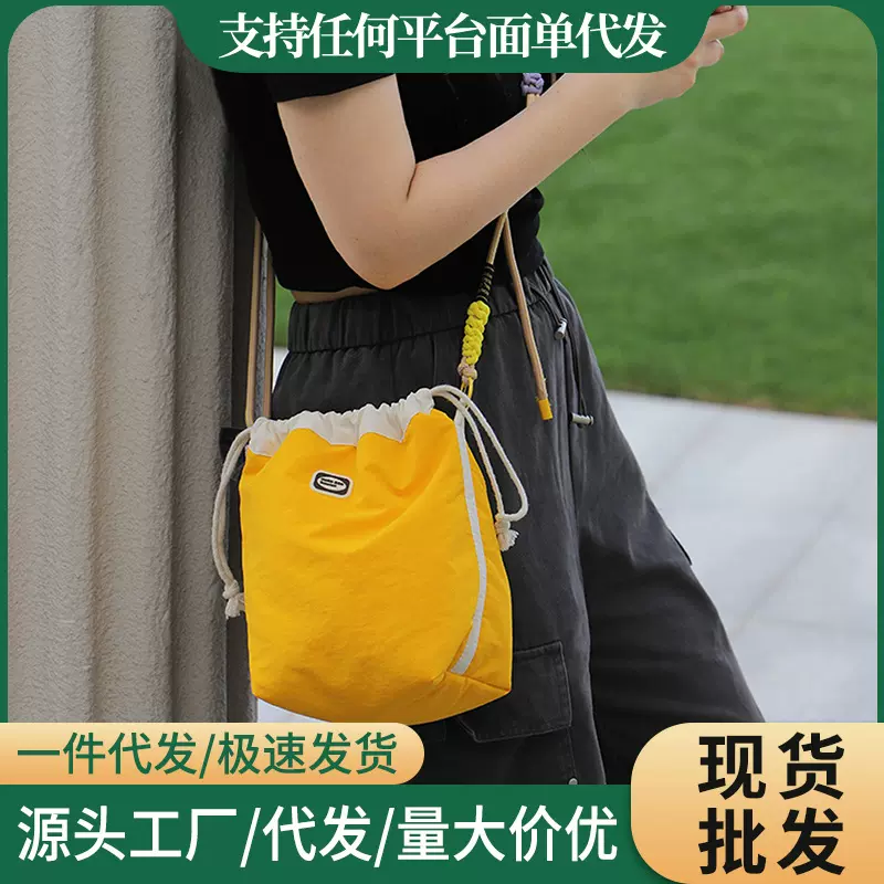 棉道尼龙防水束口收纳袋防撞相机包旅游斜跨化妆包女多功能收纳包