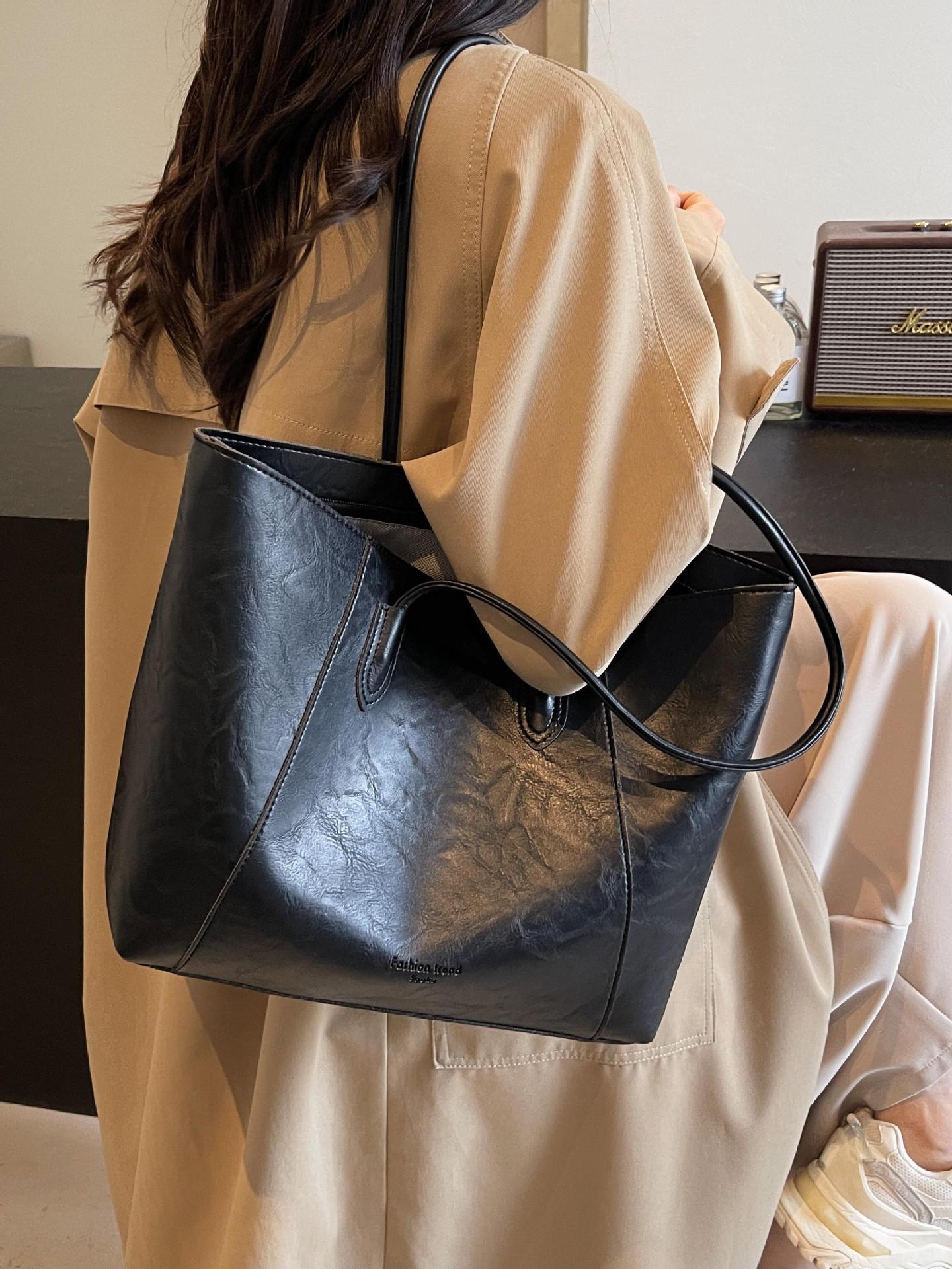 Bolsa de mano transfronteriza de gran capacidad para mujeres 2025 nueva bolsa de brazo portátil de viaje de alta calidad bolso de hombro casual