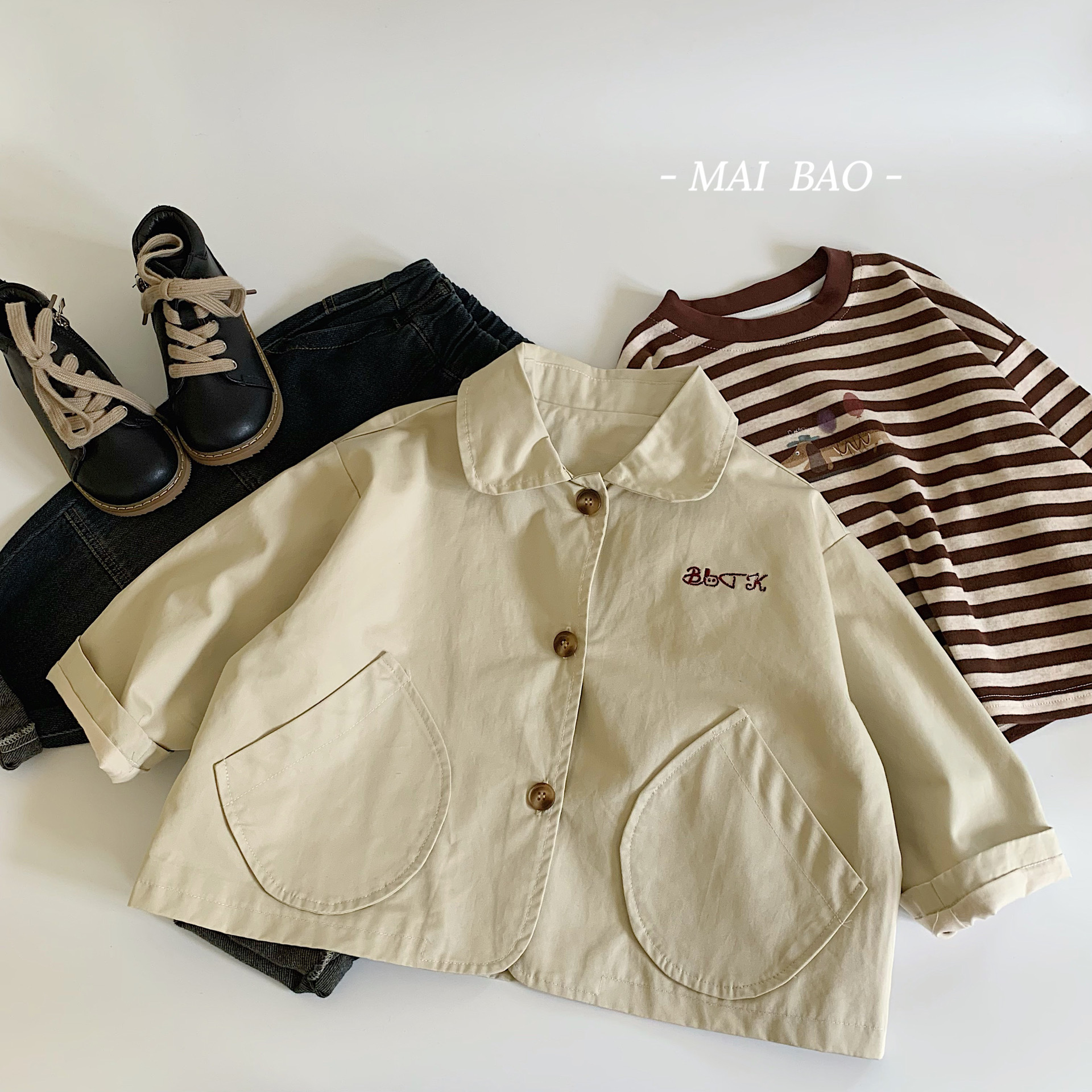 Mai Bao chaqueta infantil 2025 primavera nuevos productos sueltos versátiles letras bordadas de color sólido niños de algodón cardigan de moda