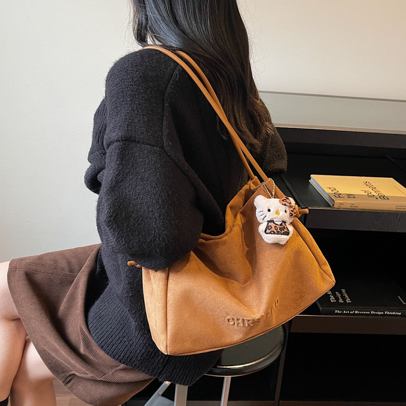 Otoño y invierno bolsas de gran capacidad para mujeres 2025 nuevo retro viaje bolsas de hombro de tern de camisa ocio bolsas de mano