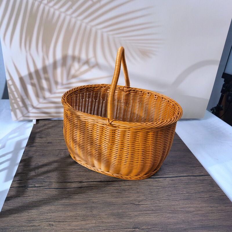 藤の手提げかごの藤編みのかごのプラスチック編みの藤のかごの復古の田園の生花の手提げの花のかごの編みのかごの野菜のかご|undefined