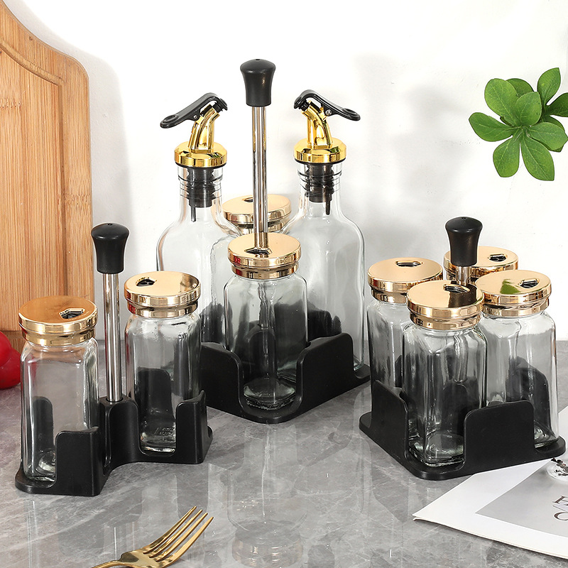 Botella de condimento de vidrio de cocina ligera de lujo al por mayor humedad lata de sal condimento lata de botella de sal
