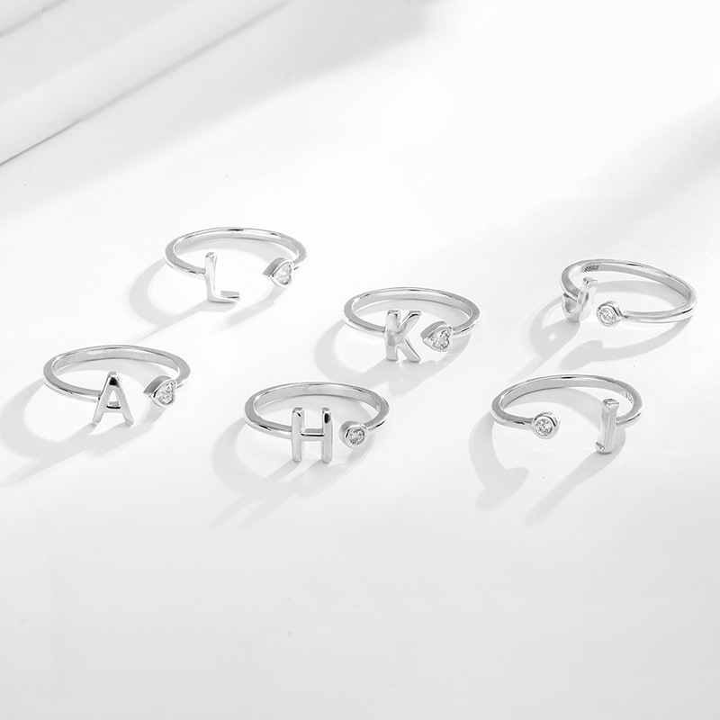 Joyería transfronteriza 26 letras inglesas s925 anillo de plata esterlina personalidad temperamento europeo y americano hombres y mujeres pulsera de anillo abierto
