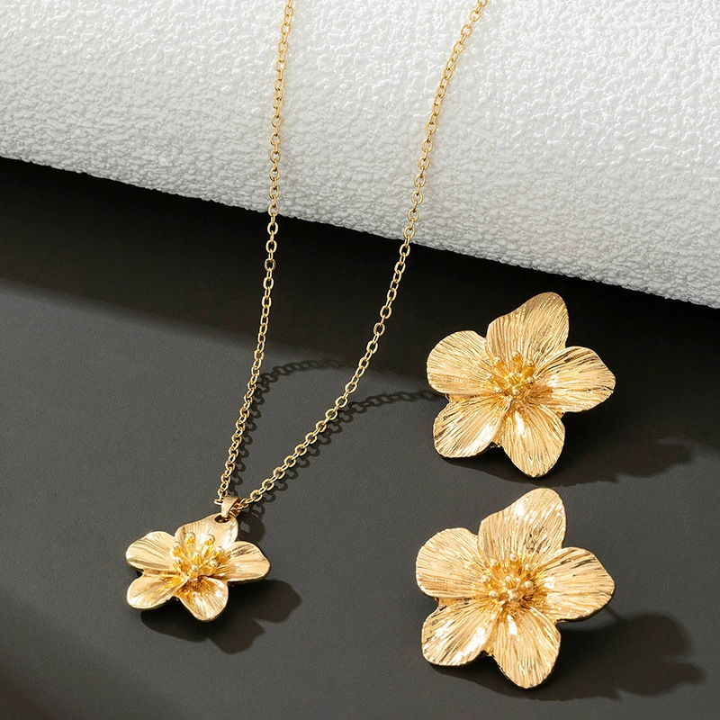 Europa y los Estados Unidos moda transfronteriza venta caliente flor simple personalidad universal mujer raqueta de calle conjunto de decoración joyas de moda