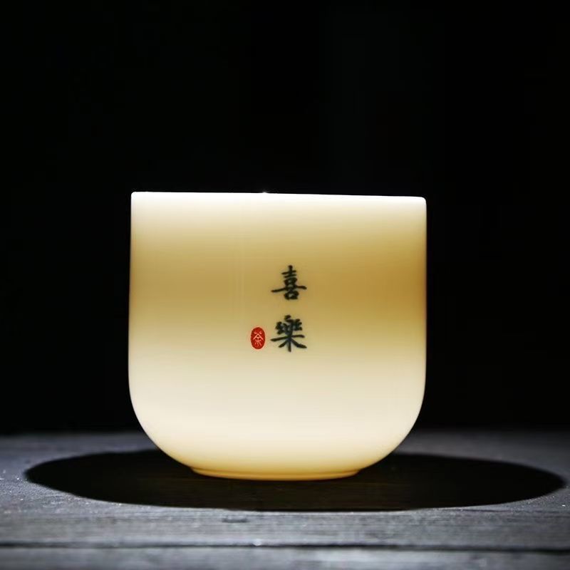 Dehua porcelana blanca doméstica de cerámica de lana taza de jade taza de té creativa fábrica de venta directa