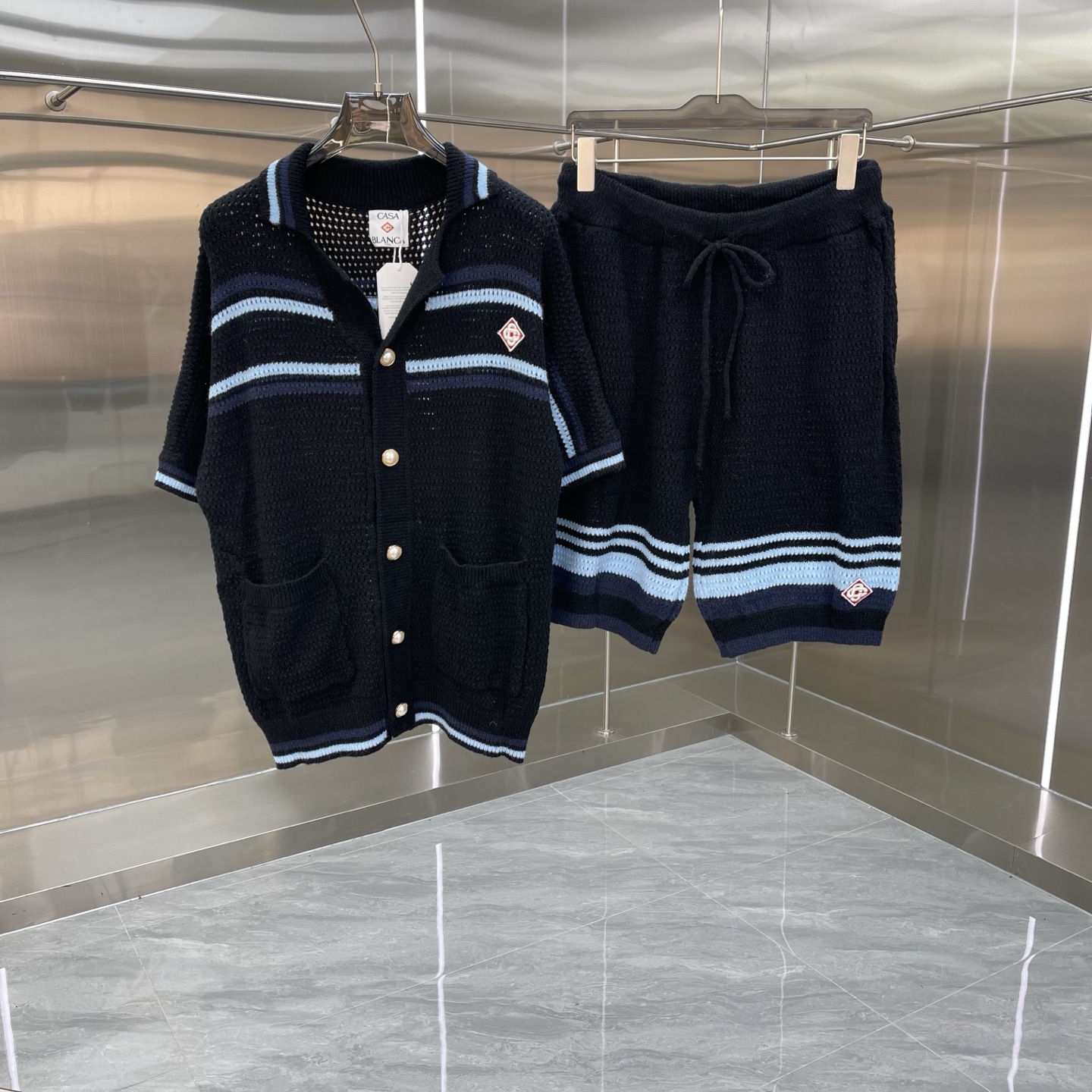 Comercio exterior casa Casablanca suéter suéter de manga corta jacquard cardigan polo pareja pantalones cortos traje