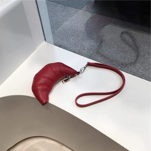 Wholesale cross-border French niche design texture soft leather mini croissant retro exquisite hand-held lanyard zero