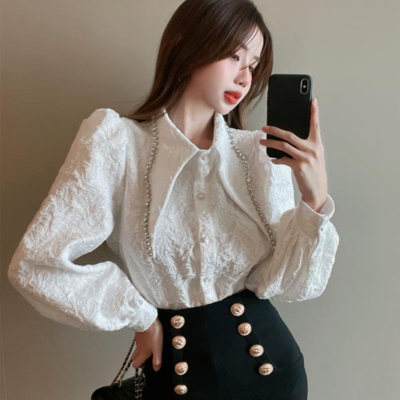 디자인 센스 인 스타일 무거운 산업 다이아몬드로 장식 된 주름 셔츠 여성의 2024 가을 뉴 홍콩 스타일 레트로 웨스턴 스타일 트렌디 한 작은 셔츠