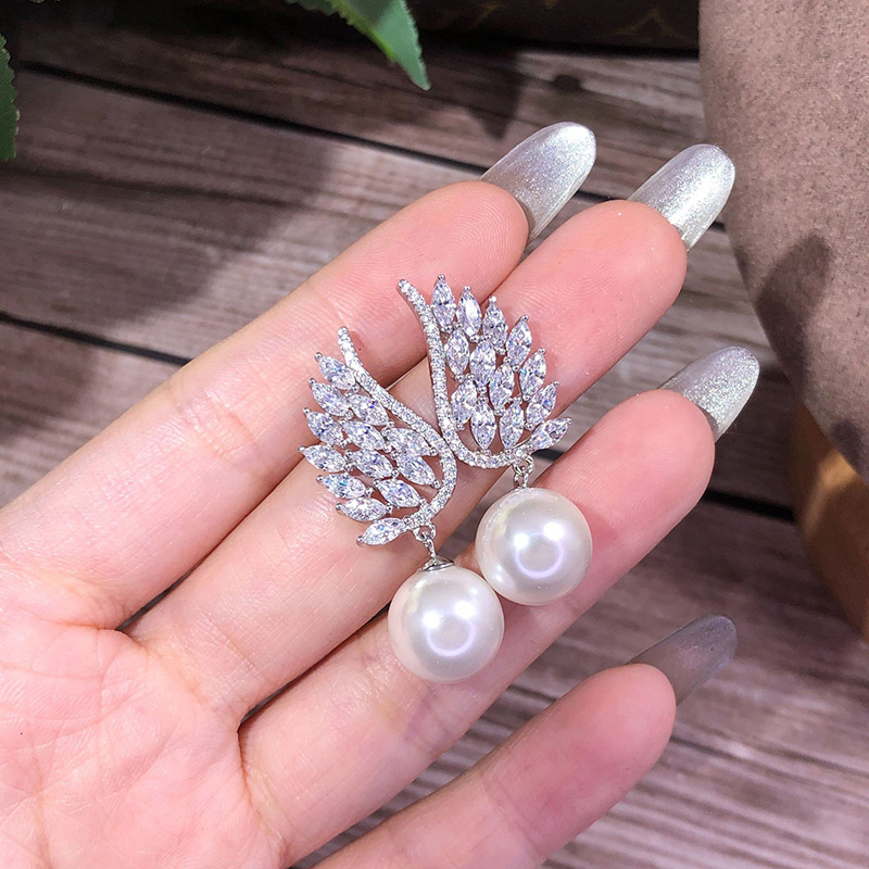 Boucles d oreilles pendantes perle ailes d ange élégantes_voghion.com