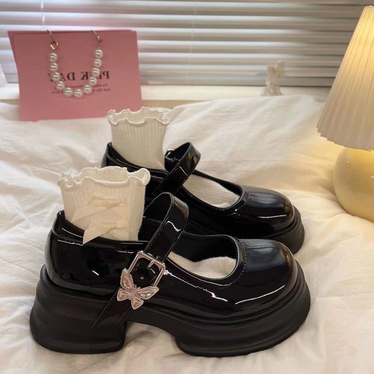Zapatos de cuero franceses de Marizhen para mujeres 2025 primavera nueva cabeza negra redonda japonesa con suela gruesa de tacones altos retrógrados zapatos para mujeres