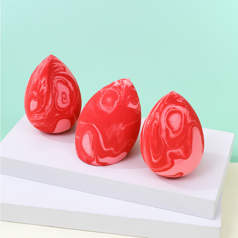 Gota de agua en forma de calabaza maquillaje de belleza de huevo soplo de polvo color mezclado sin látex maquillaje esponja colchón de aire maquillaje huevo fábrica color personalizado
