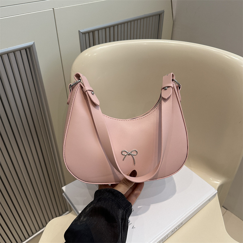 Bolso de axila con lazo para mujer 2024 nuevo estilo literario minimal bolso de hombro textura de viaje de moda de luna nueva marea