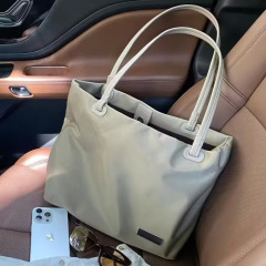 新型ナイロンショルダーバッグ大容量シンプルファッション百合バッグ通勤フィットネススポーツ雑物収納バッグ