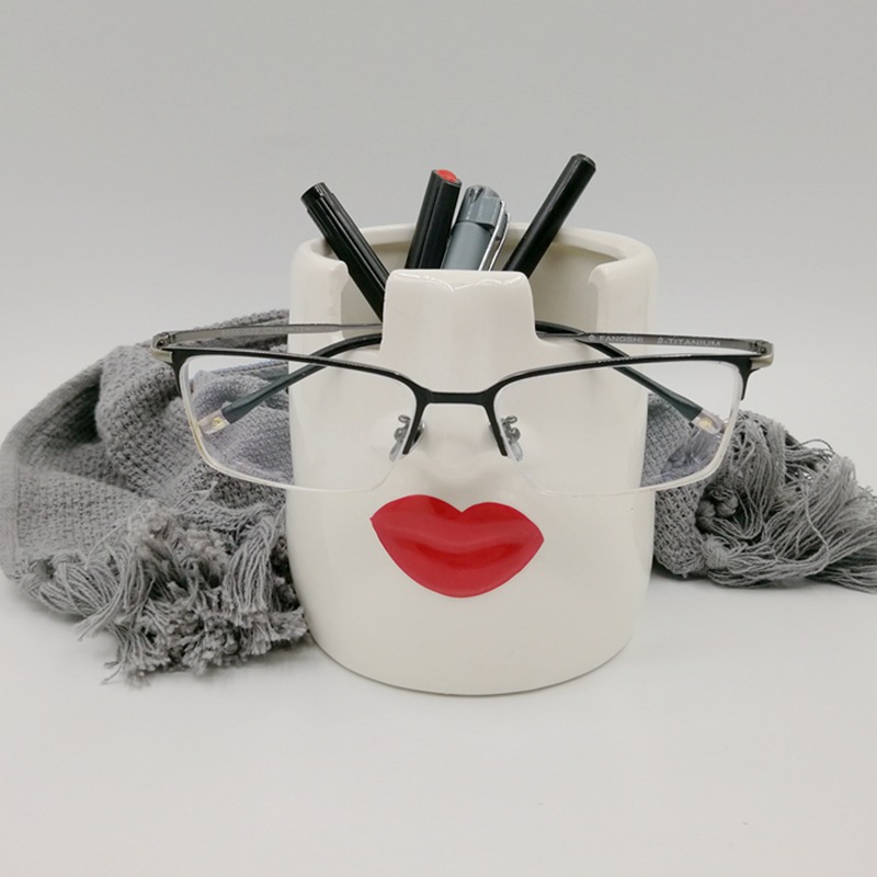 Portalápices de cerámica europea y americana transfronteriza Portalápices de cerámica de colores Portalápices de escultura facial Portalápices de gafas Portalápices de almacenamiento Labios rojos Portalápices de escritorio
