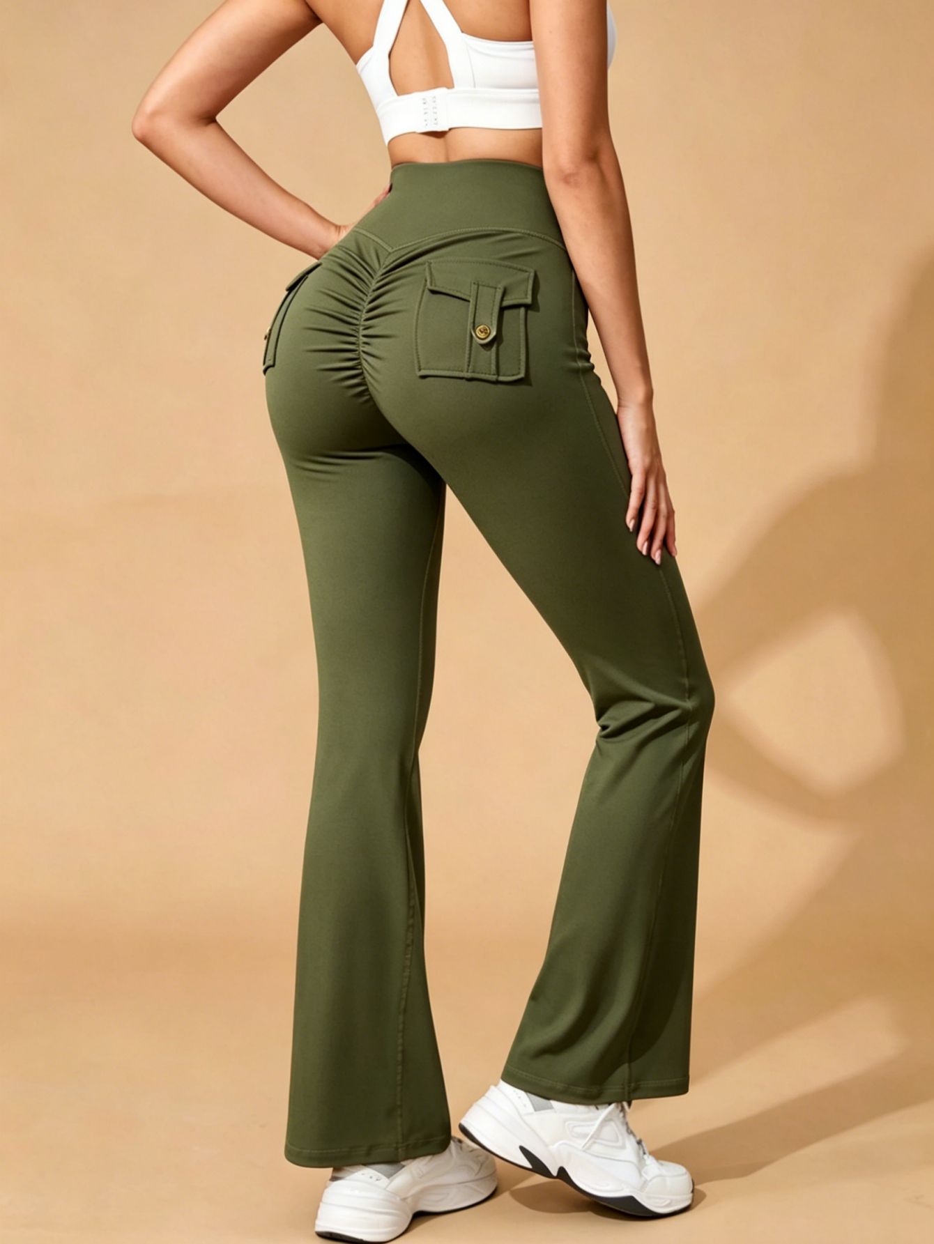 Green flared trousers, polyester