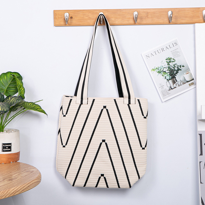 Knitted wavy shoulder bag